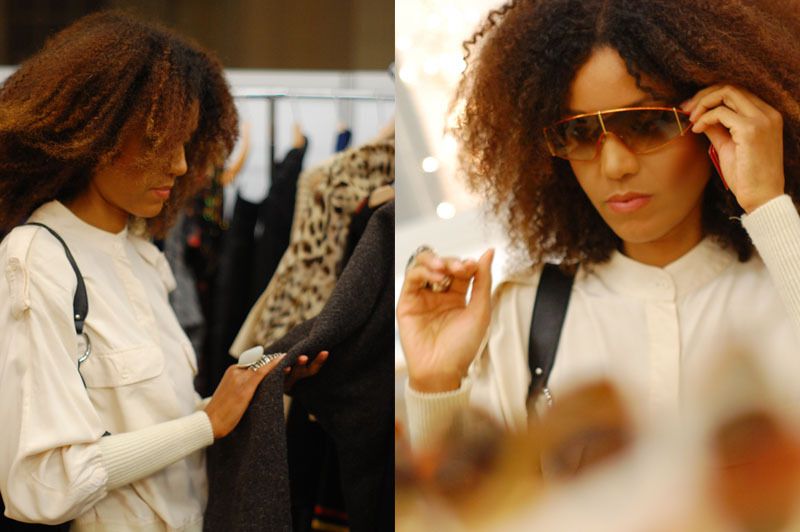 Ndoema The Global Girl is photographed shopping for vintage eyewear and clothing.