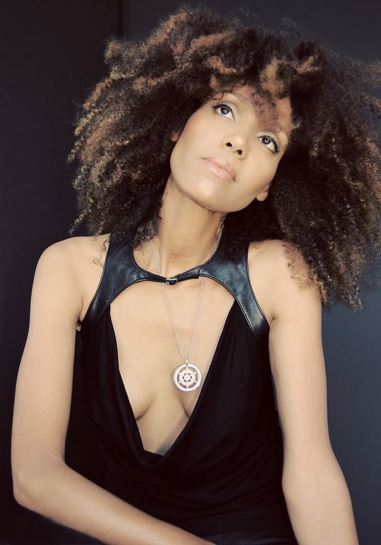 Ndoema wears a leather harness top from Plein Sud and Silver Sterling Pendant from Samsara Workshop