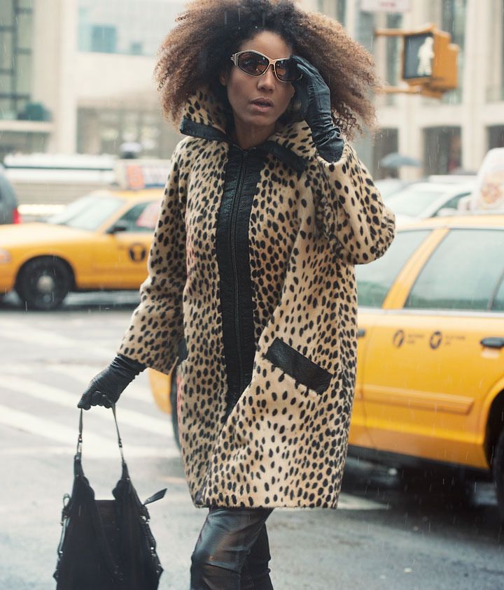 The Global Girl: Ndoema stars in a Fashion Editorial by Paris-based photographer Kamel Lahmadi of Style & The City. Ndoema wears a vintage leopard coat, Dolce & Gabbana suede bag, Diesel leather leggings, Betsey Johnson leopard stilettos and vintage Paloma Picasso sunglasses from The Guise Archives
