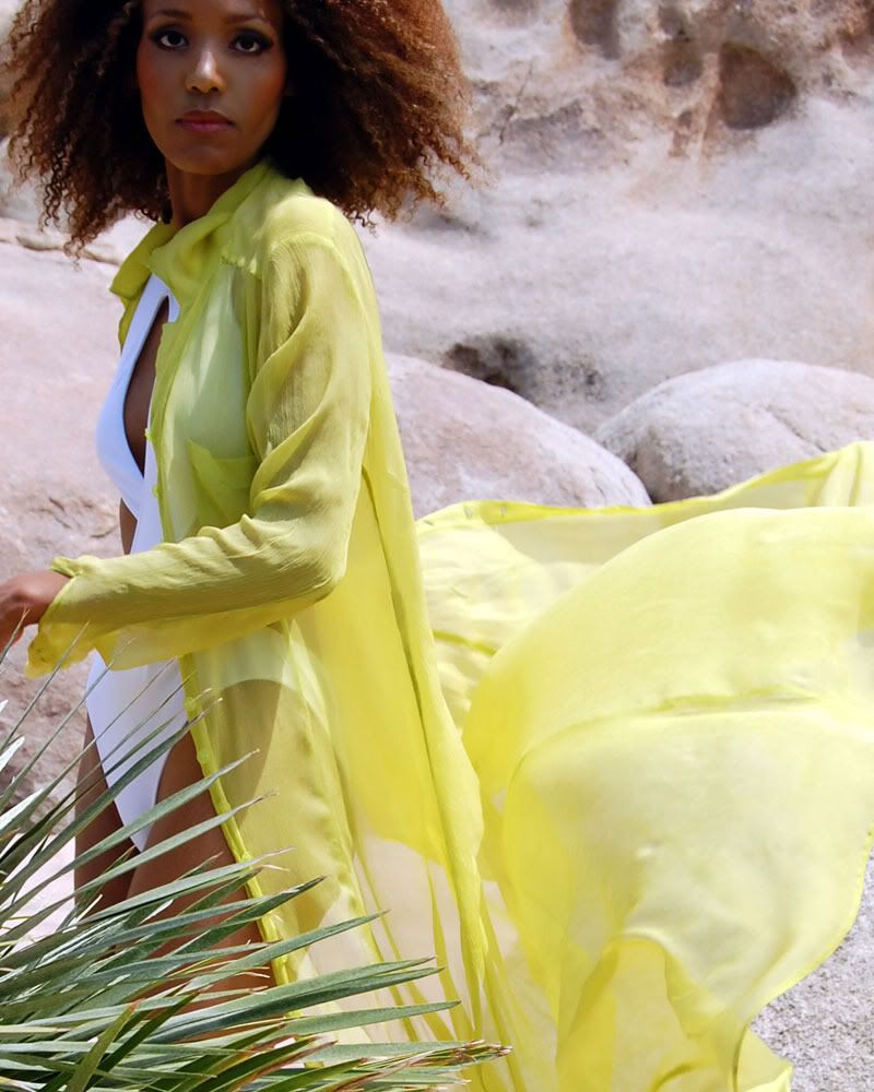 Ndoema wears a neon blouse by Plein Sud, white sandals by Pour La Victoire and white cut out swimsuit.