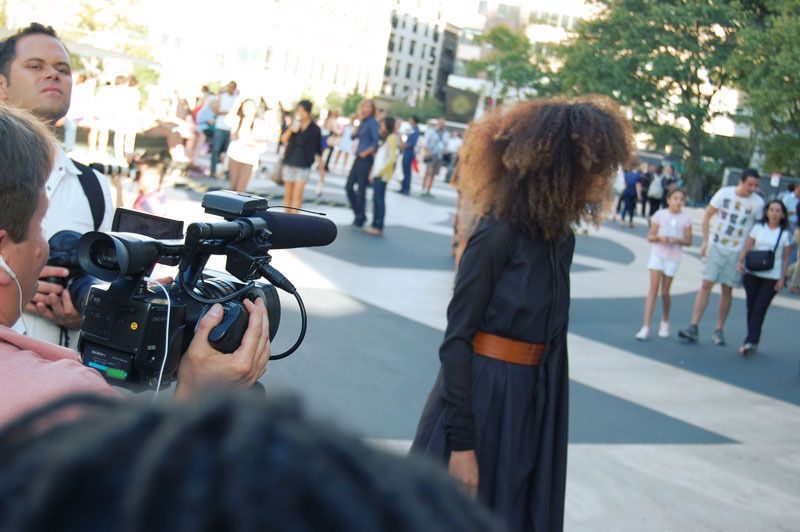 Ndoema The Global Girl wears a dress by Mexican designer Cesar Arrellanes, belt by Acne and shoes by Report Signature during New York Fashion Week.