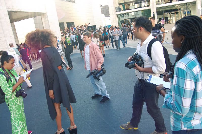 Ndoema The Global Girl wears a dress by Mexican designer Cesar Arrellanes, belt by Acne and shoes by Report Signature during New York Fashion Week.