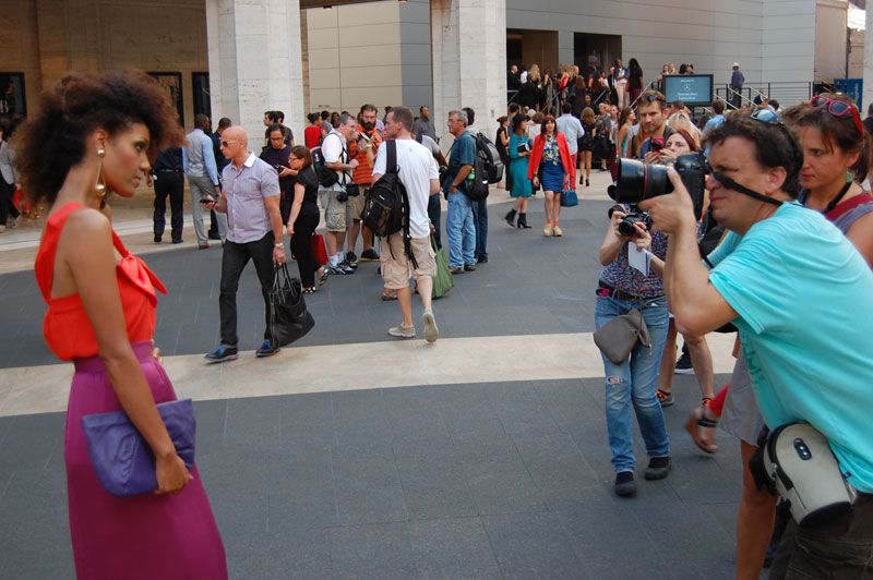 Ndoema The Global Girl arrives at the Lincoln Center during New York Fashion Week. Ndoema wears Alice + Olivia Oversized Bow Blouse, Jenni Kayne silk skirt, Nicholas Kirkwood Shoes, Vintage Accessories.
