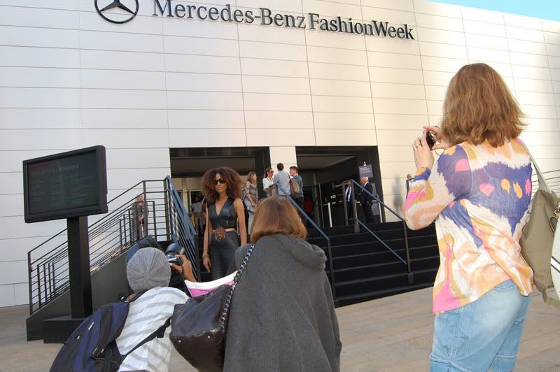 Ndoema The Global Girl arrives at the Lincoln Center during New York Fashion Week. Ndoema wears a black leather dress, ethnic belt, Report Signature shoes and Chloe Sunglasses