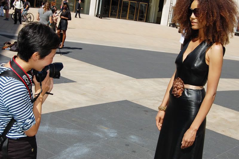 Ndoema The Global Girl arrives at the Lincoln Center during New York Fashion Week. Ndoema wears a black leather dress, ethnic belt, Report Signature shoes and Chloe Sunglasses