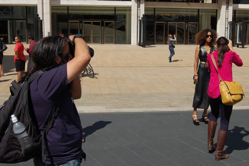 Ndoema The Global Girl arrives at the Lincoln Center during New York Fashion Week. Ndoema wears a black leather dress, ethnic belt, Report Signature shoes and Chloe Sunglasses