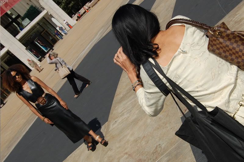 Ndoema The Global Girl arrives at the Lincoln Center during New York Fashion Week. Ndoema wears a black leather dress, ethnic belt, Report Signature shoes and Chloe Sunglasses
