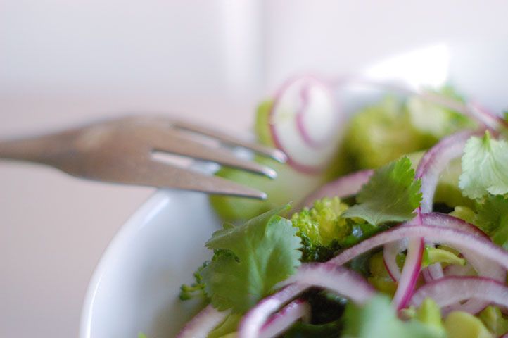 The Global Girl shares her raw vegan diet essentials: raw marinated broccoli salad recipe with cilantro and red onion