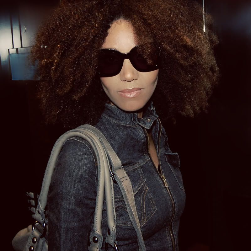Ndoema wears Chloé sunglasses, Dolce and Gabbana cropped denim jacket, G-Star Raw skinny jeans and Linea Pelle leather bag.