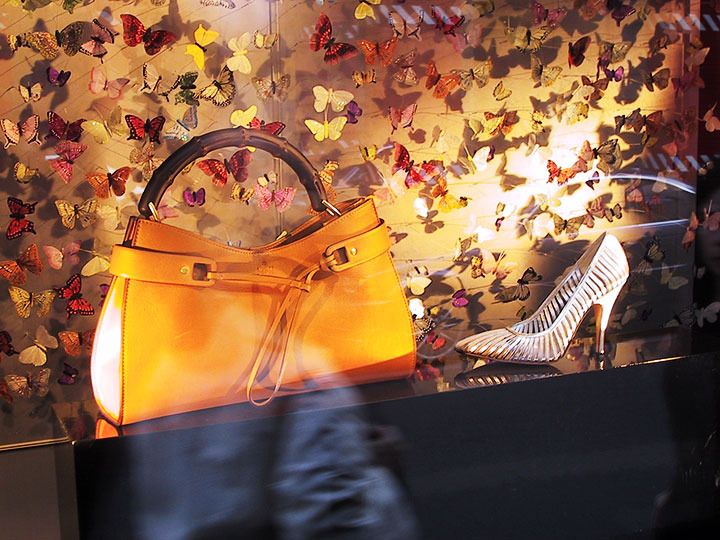 The Global Girl: Windowshop with Ndoema as she strolls down Via Monte Napoleone in Milan admiring the Gucci window display.