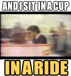 Michael Jackson sit in a cup in a ride Pictures, Images and Photos