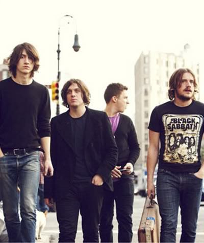  Jamie Cook Lead guitar backing vocals Nick O'Malley bass guitar 